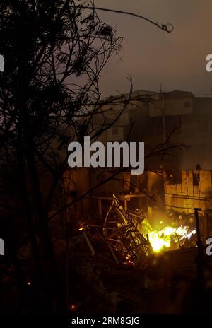 A house is burned during a fire in the Cerro Ramaditas in Valparaiso, Chile, on April 13, 2014. At least 11 people were killed over the weekend in a massive forest fire that broke out in Chile s port city of Valparaiso, authorities said Sunday. President Michelle Bachelet declared a state of emergency in the city and sent the army in to maintain order as thousands of residents were evacuated. (Xinhua/Str) (jp) (ah) CHILE-VALPARAISO-ENVIRONMENT-FIRE PUBLICATIONxNOTxINxCHN   a House IS burned during a Fire in The Cerro Ramaditas in Valparaiso Chile ON April 13 2014 AT least 11 Celebrities Were K Stock Photo