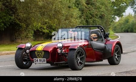 Whittlebury,Northants,UK -Aug 26th 2023: 2022 red Caterham sports car travelling on an English country road Stock Photo