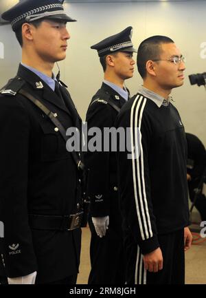 (140417) -- BEIJING, April 17, 2014 (Xinhua) -- Qin Zhijun (R), an alleged rumormonger, goes on trial at the Chaoyang District People s Court in Beijing, capital of China, April 17, 2014. Qin Zhihui, known as Qinhuohuo in cyberspace, was accused of creating and spreading rumors about several Chinese celebrities including popular TV hostess Yang Lan, as well as China s former Ministry of Railways, via Sina Weibo, China s Twitter-like service, from December 2012 to August 2013, according to prosecutors. Qin was sentenced to two years on defamation charges and another year for affray on Thursday. Stock Photo