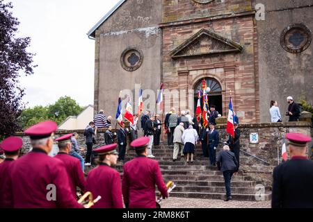 Pexonne, France. 27th Aug, 2023. People go to the village church for a memorial service for the victims of the attack on Pexonne on August 27, 1944. In late August 1944, German soldiers invaded the French village of Pexonne and kidnapped dozens of villagers. The action was led by SS Hauptsturmführer Erich Otto Wenger. Now Wenger's grandchildren came to the town for the first time to take part in a memorial service for the victims of the crime. Credit: Philipp von Ditfurth/dpa/Alamy Live News Stock Photo