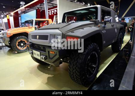 BEIJING, April 20, 2014 - A George Patton go-anywhere vehicle is displayed during the media preview of the 2014 Beijing International Automotive Exhibition in Beijing, China, April 20, 2014. The auto show will be held on April 21-29, attracting over 2,000 exhibitors from 14 countries and regions. (Xinhua/Li Mingfang) (yxb) CHINA-BEIJING-AUTO-EXHIBITION (CN) PUBLICATIONxNOTxINxCHN   Beijing April 20 2014 a George Patton Go Anywhere Vehicle IS displayed during The Media Preview of The 2014 Beijing International Automotive Exhibition in Beijing China April 20 2014 The Car Show will Be Hero ON Apr Stock Photo