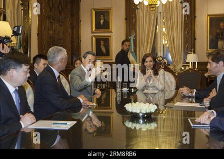 (140424) -- BUENOS AIRES, April 24, 2014 (Xinhua) -- Argentina s President Cristina Fernandez de Kirchner (2nd, R) meets with visiting Chinese Foreign Minister Wang Yi (3rd, L) at the presidential palace in Buenos Aires, Argentina, April 23, 2014. (Xinhua/Martin Zabala)(zhf) ARGENTINA-BUENOS AIRES-PRESIDENT-CHINA-FM-MEET PUBLICATIONxNOTxINxCHN   Buenos Aires April 24 2014 XINHUA Argentina S President Cristina Fernandez de Kirchner 2nd r Meets With Visiting Chinese Foreign Ministers Wang Yi 3rd l AT The Presidential Palace in Buenos Aires Argentina April 23 2014 XINHUA Martin Zabala  Argentina Stock Photo