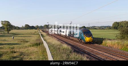 Avanti west coast Alstom Pendolino train 390049 on the west coast mainline in Lancashire Stock Photo