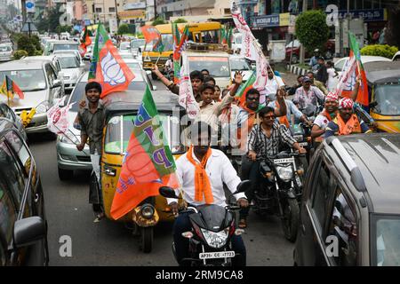 (140517) -- VISAKHAPATNAM, May 17, 2014 (Xinhua) -- Supporters of India s main opposition Bharatiya Janata Party (BJP) and its allies celebrate during a parade in Visakhapatnam of Andra Pradesh, India, May 17, 2014. BJP Friday created history by winning the general elections by a landslide, the most resounding victory by any party in the last 30 years, decimating the Nehru-Gandhi dynasty-led ruling Congress Party. (Xinhua/Zheng Huansong) INDIA-VISAKHAPATNAM-BJP-CELEBRATION PUBLICATIONxNOTxINxCHN   May 17 2014 XINHUA Supporters of India S Main Opposition Bharatiya Janata Party BJP and its  Cele Stock Photo
