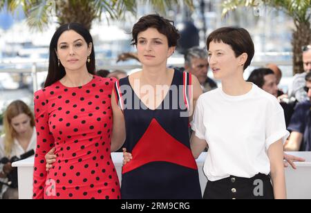 (140518) -- CANNES, May 18, 2014 (Xinhua) -- Italian actress Monica Bellucci, Italian director Alice Rohrwacher and Italian actress Alba Rohrwacher (from L to R) pose during the photocall for Le Meraviglie (The Wonders) at the 67th Cannes Film Festival in Cannes, France, May 18, 2014. The movie is presented in the Official Competition of the festival which runs from May 14 to 25. (Xinhua/Ye Pingfan) (djj) FRANCE-CANNES-FILM FESTIVAL-THE WONDERS-PHOTO CALL PUBLICATIONxNOTxINxCHN   Cannes May 18 2014 XINHUA Italian actress Monica Bellucci Italian Director Alice Rohrwacher and Italian actress Alb Stock Photo