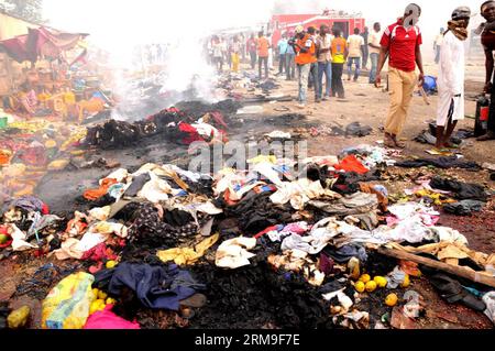 (140521) -- JOS, (Xinhua) -- People gather at the blast site in Jos, Nigeria, May 20, 2014. Death toll of the twin blast on a busy market road in Nigeria s central city of Jos on Tuesday rose to 118, after casualty figures were further collated from various health facilities, an official told reporters here. (Xinhua/Nigeria News Agency) NIGERIA-JOS-BLAST-DEATH TOLL PUBLICATIONxNOTxINxCHN   Jos XINHUA Celebrities gather AT The Blast Site in Jos Nigeria May 20 2014 Death toll of The Twin Blast ON a Busy Market Road in Nigeria S Central City of Jos ON Tuesday Rose to 118 After Casualty Figures We Stock Photo