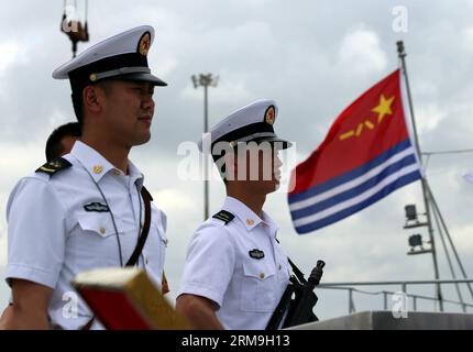 (140523) -- YANGON, May 23, 2014 (Xinhua) -- Chinese Navy soldiers stand on the deck of a Chinese naval vessel at Thilawa Port in Yangon, Myanmar, May 23, 2014. Two Chinese naval ships, Zheng He training vessel and Wei Fang defense vessel, called at the Myanmar International Terminals Thilawa (MITT) in Yangon Friday morning for their second leg of Asian voyage. (Xinhua/U Aung)(zhf) MYANMAR-YANGON-CHINESE NAVY-VISIT PUBLICATIONxNOTxINxCHN   Yangon May 23 2014 XINHUA Chinese Navy Soldiers stand ON The Deck of a Chinese Naval Vessel AT  Port in Yangon Myanmar May 23 2014 Two Chinese Naval Ships Z Stock Photo