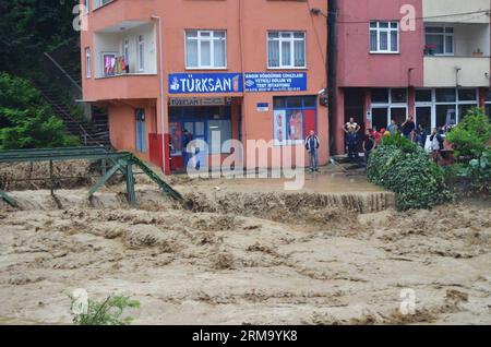 (140606) -- ISTANBUL, June 6, 2014 (Xinhua) -- The road was blocked by flood in Zonguldak in Turkey, on June 6, 2014. Excessive precipitation, which started from the beginning of the week paralyzed daily life in several parts of the country. Heavy downpours triggered flash floods in some rural and mountain areas of Turkey. Main roads were waterlogged due to floods since the beginning of the week. According to meteorology reports, the rainfall will continue till next week. (Xinhua/Cihan) TURKEY-RAINFALL-DISASTER PUBLICATIONxNOTxINxCHN   Istanbul June 6 2014 XINHUA The Road what blocked by Flood Stock Photo