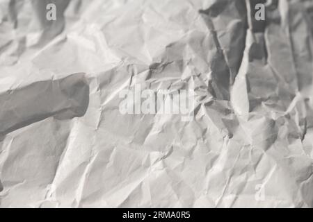 Grey crumpled with curled corners mock up. Apt to use as wallpaper, backgrounds, post cards, letters, manuscripts, historical ancient backdrops. Stock Photo