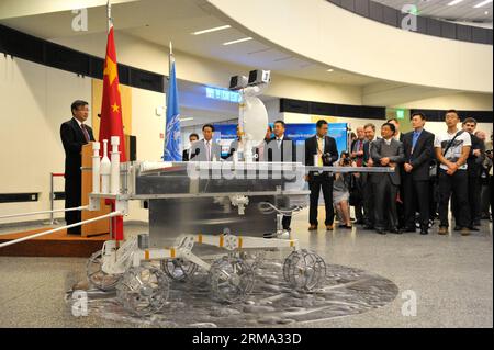 (140613) -- VIENNA, June 13, 2014 (Xinhua) -- Tian Yulong, secretary-general of the China National Space Administration (CNSA), delivers a speech during the donationg ceremony of the replica of lunar rover Yutu, the Jade Rabbit, at Vienna International Center, in Vienna, Austria, June 13, 2014. CNSA donated a replica of which the exact same size as the real lunar rover Yutu to the United Nations aerospace bureau here on Friday.Lunar probe Chang e-3 with rover Yutu on board, landed on the moon s Sinus Iridum in 2013, making China the third country to put a rover on the moon after the United Sta Stock Photo