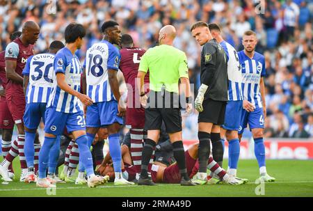 Tomas Soucek of West Ham receives treatment after colliding with Bart Verbruggen of Brighton during the Premier League match between Brighton and Hove Albion and West Ham United at the American Express Stadium  , Brighton , UK - 26th August 2023.  Photo Simon Dack / Telephoto Images Editorial use only. No merchandising. For Football images FA and Premier League restrictions apply inc. no internet/mobile usage without FAPL license - for details contact Football Dataco Stock Photo