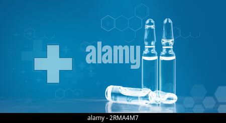 Pharmaceutical background with glass bottles with clear liquid. Science and medicine, Telemedicine, virtual hospital, E-health, online medical concept Stock Photo