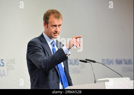 (140617) -- VIENNA, June 17, 2014 (Xinhua) -- Michael Mann, spokesperson of EU High Representative for Foreign Affairs and Security Policy Catherine Ashton, speaks to the media in Vienna, Austria, June 17, 2014. Iran and the so-called P5+1 group, five permanent members of the United Nations Security Council plus Germany, are engaging in the fifth round of nuclear negotiations in the capital city of Austria. (Xinhua/Qian Yi) AUSTRIA-VIENNA-IRANIAN NUCLEAR TALKS PUBLICATIONxNOTxINxCHN   Vienna June 17 2014 XINHUA Michael Man spokesperson of EU High Representative for Foreign Affairs and Security Stock Photo