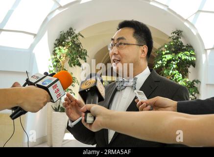 (140617) -- VIENNA, June 17, 2014 (Xinhua) -- Wang Qun, China s envoy to the talks and Director-General of the Department of Arms Control of the Ministry of Foreign Affairs of China, speaks to reporters in Vienna, Austria, June 17, 2014. Iran and the so-called P5+1 group, five permanent members of the United Nations Security Council plus Germany, are engaging in the fifth round of nuclear negotiations in the capital city of Austria. (Xinhua/Qian Yi) AUSTRIA-VIENNA-IRANIAN NUCLEAR TALKS PUBLICATIONxNOTxINxCHN   Vienna June 17 2014 XINHUA Wang Qun China S Envoy to The Talks and Director General Stock Photo