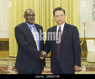 (140623) -- BEIJING, June 23, 2014 (Xinhua) -- Zhao Leji (R), a member of the Political Bureau of the Communist Party of China (CPC) Central Committee, who is also head of the Organization Department of the CPC Central Committee, meets with a delegation from Sudan s National Congress Party (NCP), which is led by Eldirdiry Mohamed Ahmed (L), the NCP s foreign minister, in Beijing, China, June 23, 2014. (Xinhua/Xie Huanchi) (hdt) CHINA-BEIJING-ZHAO LEJI-SUDANESE-MEETING (CN) PUBLICATIONxNOTxINxCHN   Beijing June 23 2014 XINHUA Zhao  r a member of The Political Bureau of The Communist Party of Ch Stock Photo