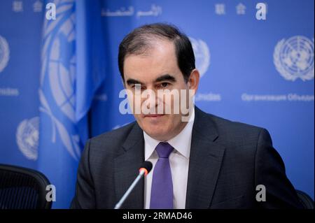 (140703) -- New York, July 2, 2014 (Xinhua) -- John Ging, operations director for the UN Office for the Coordination of Humanitarian Affairs (OCHA), speaks during a pres s briefing at the United Nations headquarters in New York, on July 2, 2014. Yemen, reeling from political instability and insecurity from jihadist attacks, is on the brink of an economic collapse, Ging said here Wednesday, blaming the mild, but popular, drug khat for much of the Aden Gulf nation s woes. (Xinhua/Niu Xiaolei) UN-NEW YORK-YEMEN-BRIEFING PUBLICATIONxNOTxINxCHN   New York July 2 2014 XINHUA John went Operations Dir Stock Photo