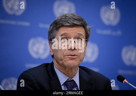 (140708) -- NEW YORK, July 8, 2014 (Xinhua) -- Jeffrey Sachs, director of the Sustainable Development Solutions Network (SDSN) of Columbia University s Earth Institute, speaks during a press conference on the Deep Decarbonization Pathway Project (DDPP) interim report , at the UN headquarters in New York, on July 8, 2014. The United Nations on Tuesday issued preliminary findings from a 15-nation study on ways to reduce global warming through carbon emission reduction in a bid to keep the world s temperature below a 2 degree Celsius increase. (Xinhua/Niu Xiaolei) UN-NEW YORK-ENVIRONMENT-DECARBON Stock Photo