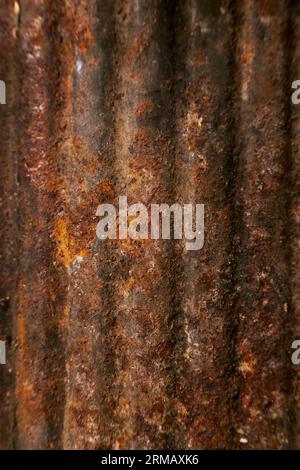 Sheet of old metal surface with rusty surface. Abstract vintage patern background. Rusty corrugated iron, oxidized corroded metal. Retro style concept Stock Photo