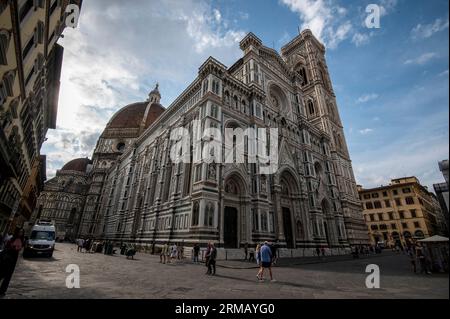 The 84.7 meters (277.9 feet) tall Giotto's Campanile (Giotto’s bell tower) standing next to the of the Santa Maria del Fiore, (Florence Cathedral) on Stock Photo