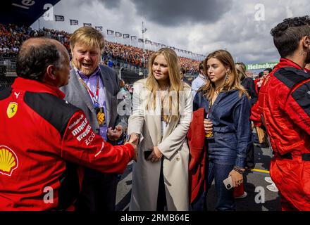 ZANDVOORT - King Willem-Alexander, Princess Amalia and Princess Alexia ahead of the F1 Grand Prix of the Netherlands at Circuit Zandvoort on August 27, 2023 in Zandvoort, Netherlands. ANP REMKO DE WAAL Stock Photo