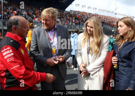 Zandvoort, Netherlands. 27th Aug, 2023. Zandvoort, Netherlands, 27. August 2023; Dutch FIA Formula 1 Grand Prix, the race, King Willem Alexander, Prince of Oranien-Nassau and Alexia of Oranien-Nassau, Princess Catharina-Amalia, daughters of the royal familiy during their starting grid walk meeting the Ferrari principal Frédéric Vasseur from France, Formel 1 in Holland, picture and copyright by Arthur THILL/ATP images (THILL Arthur/ATP/SPP) Credit: SPP Sport Press Photo. /Alamy Live News Stock Photo
