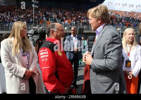 Zandvoort, Netherlands. 27th Aug, 2023. Zandvoort, Netherlands, 27. August 2023; Dutch FIA Formula 1 Grand Prix, the race, King Willem Alexander, Prince of Oranien-Nassau and Alexia of Oranien-Nassau, Princess Catharina-Amalia, daughters of the royal familiy during their starting grid walk meeting the Ferrari principal Frédéric Vasseur from France, Formel 1 in Holland, picture and copyright by Arthur THILL/ATP images (THILL Arthur/ATP/SPP) Credit: SPP Sport Press Photo. /Alamy Live News Stock Photo