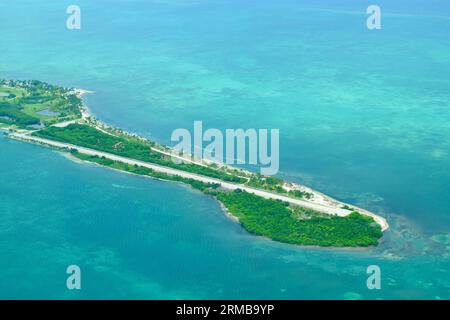 An aerial view of the runway at Caye Chapel, a private island in Belize owned by the Four Seasons Hotel and Resort. Stock Photo