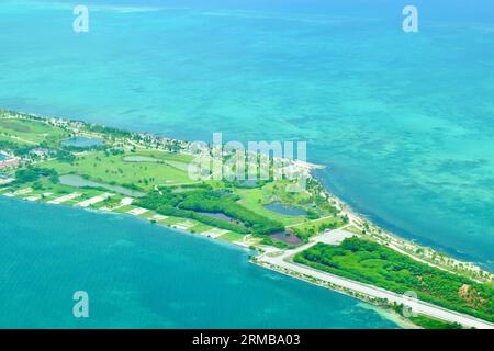 A view from the sky of Caye Chapel, a private island owned by the Four Seasons Hotel and Resorts in Belize, Central America/Caribbean. Stock Photo