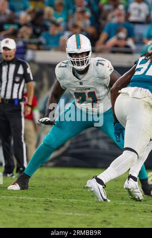 Miami Dolphins offensive tackle Kion Smith (76) protects his lane