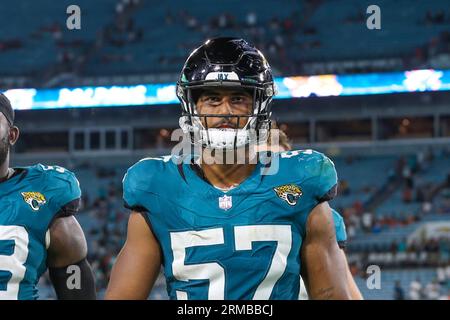 Jacksonville Jaguars linebacker Caleb Johnson (57) during the national  anthem before an NFL pre-season football game against the Miami Dolphins,  Saturday, Aug. 26, 2023, in Jacksonville, Fla. The Jaguars defeated the  Dolphins