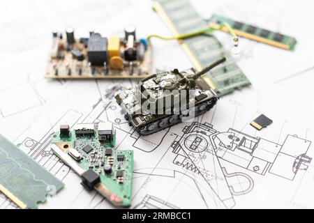 The toy tank is on the table. Children's toy military tank Stock Photo