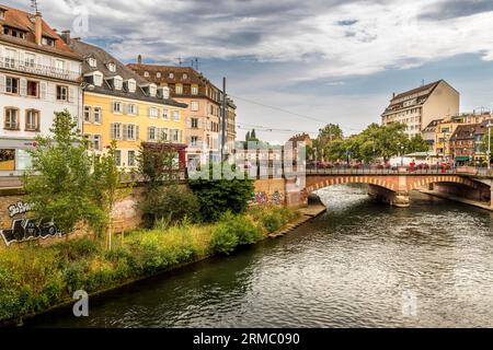 Strasbourg, France - June 19, 2023: Street with historic half-timbered houses in the Petite France district in Strasbourg, France Stock Photo