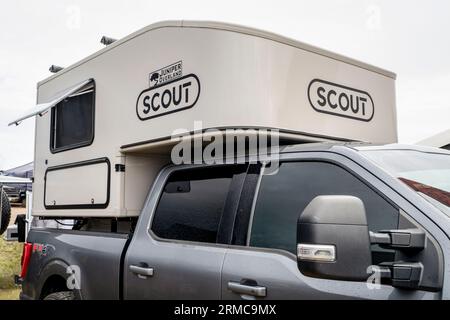 Loveland, CO, USA - August 26, 2023: Scout Yoho camper customized by Juniper Overland on Ford FX4 truck. Stock Photo