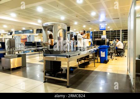 Security screening of carry-on luggage prior to the gates entrance,   Antalya airport Turkey. Luggage checking in airport. Stock Photo