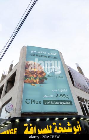 Careem plus Arabic food delivery service billboard outdoor ad Stock Photo