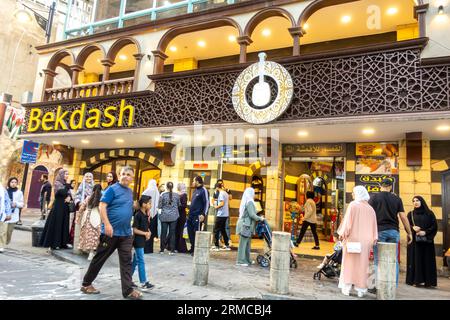 People passing by Bekdash ice cream downtown  store Amman Jordan Stock Photo