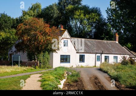 National school building 1834 with commemorative plaque, Bosham, a coastal village on the south coast in Chichester Harbour, West Sussex, UK Stock Photo