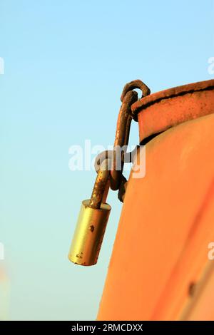 Oxidation of rusty old lock, on a metal part, closeup of photo Stock Photo