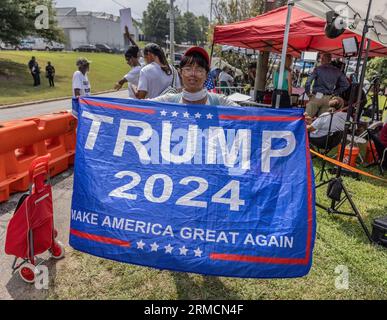ATLANTA, Ga. — August 24, 2023: A demonstrator is seen near the Fulton County Jail prior to the booking of former President Donald J. Trump. Stock Photo