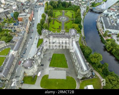 Aerial view of Kilkenny castle, Victorian remodeling of a medieval defensive structure, rolling parkland, terraced rose garden, woodlands, man-made la Stock Photo
