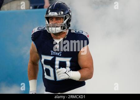 Tennessee Titans guard Aaron Brewer (55) runs onto the field before an NFL  preseason football game against the New England Patriots, Friday, Aug. 25,  2023, in Nashville, Tenn. (AP Photo/George Walker IV