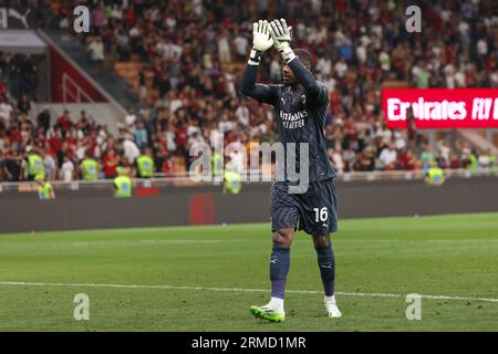 Milan, Italy. 26th Aug, 2023. Italy, Milan, august 26 2023: Mike Maignan (AC Milan goalkeeper) greets the fans in the stands at the end of soccer game AC Milan vs Torino FC, day2 Serie A 2023-2024 San Siro Stadium (Credit Image: © Fabrizio Andrea Bertani/Pacific Press via ZUMA Press Wire) EDITORIAL USAGE ONLY! Not for Commercial USAGE! Stock Photo