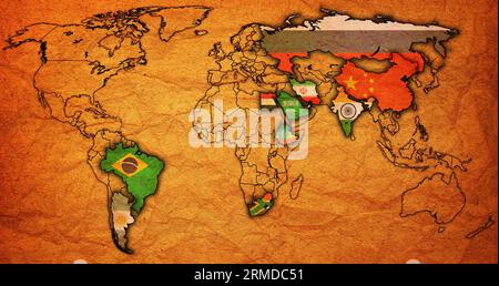 BRICS member countries and candidates flags on political world map with national borders Stock Photo