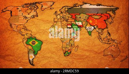 BRICS member countries and candidates flags on political world map with national borders Stock Photo