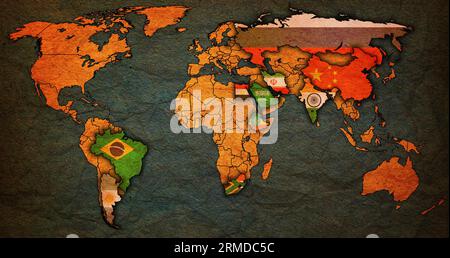 BRICS member countries and candidates flags on political world map with national borders Stock Photo