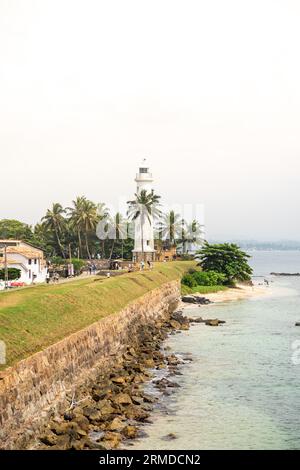 Lighthouse photo of colonial Galle Fort at the ocean in Southern Sri Lanka Stock Photo