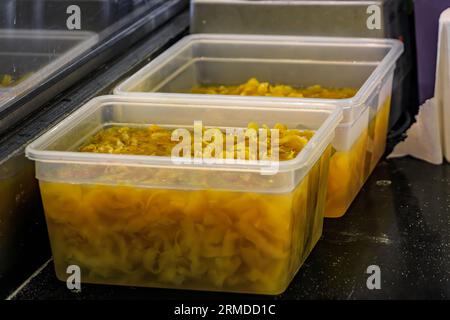 Limoncello making process, vodka infused with the zest of local lemons at an artisanal shop in the Old Town in Menton, French Riviera, South of France Stock Photo