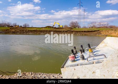 Industrial remote with joysticks, wireless, console to control tower drilling machine, big equipment to drill into the ground, for bridge foundation o Stock Photo