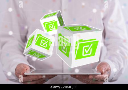 Document validation concept above a tablet held by a man in background Stock Photo