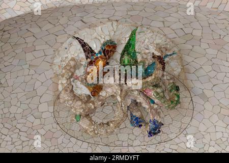 Mosaic Sun Ceiling Artistry in Park Guell by Antonio Gaudi Stock Photo